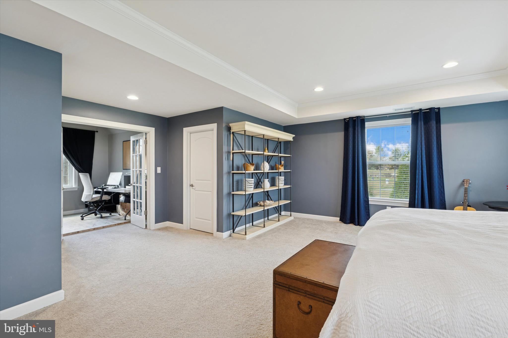 1392 Hickory Hill Road Chadds Ford, PA 19317 - Photo 18 of 35 a spacious bedroom with a bed and a tv on table