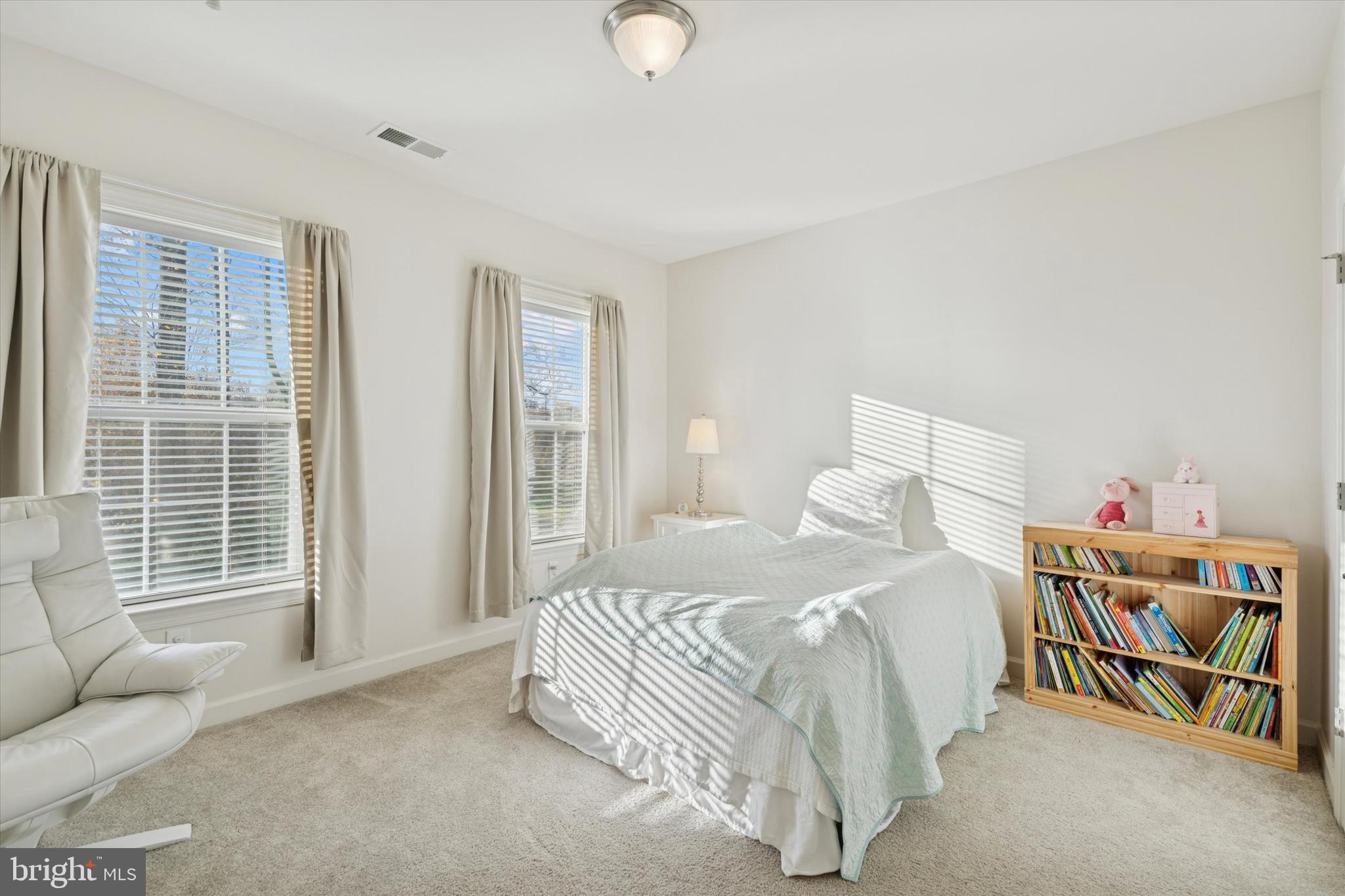 1392 Hickory Hill Road Chadds Ford, PA 19317 - Photo 22 of 35 a bedroom with a bed and a couch