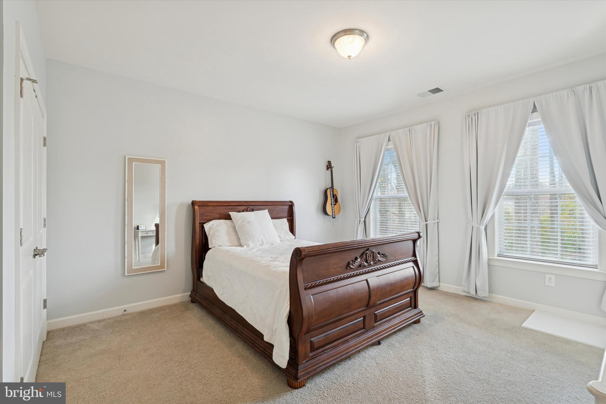 1392 Hickory Hill Road Chadds Ford, PA 19317 - Photo 25 of 35 a bedroom with a bed and a window