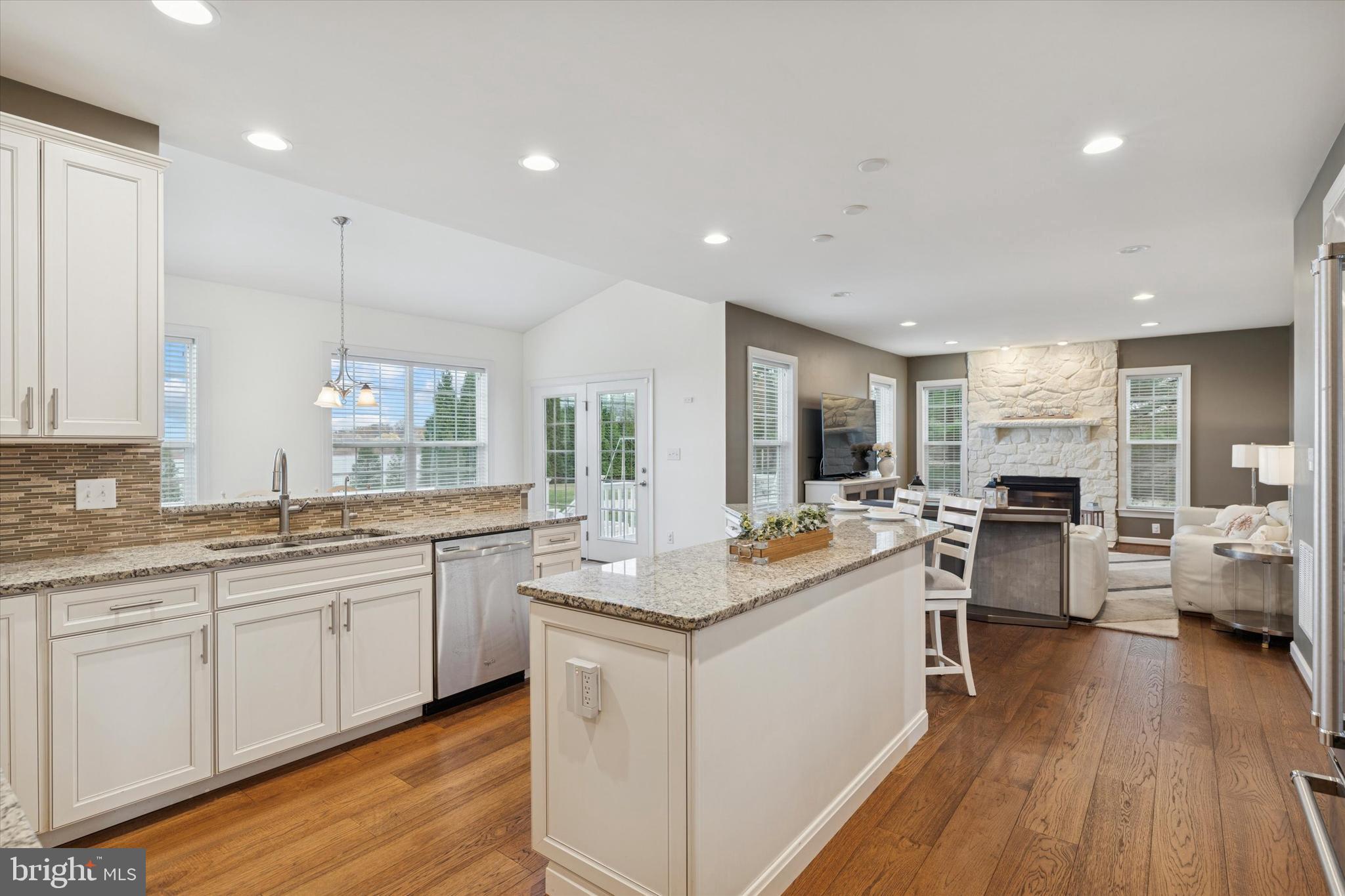 1392 Hickory Hill Road Chadds Ford, PA 19317 - Photo 10 of 35 a kitchen with a sink stove cabinets and wooden floor
