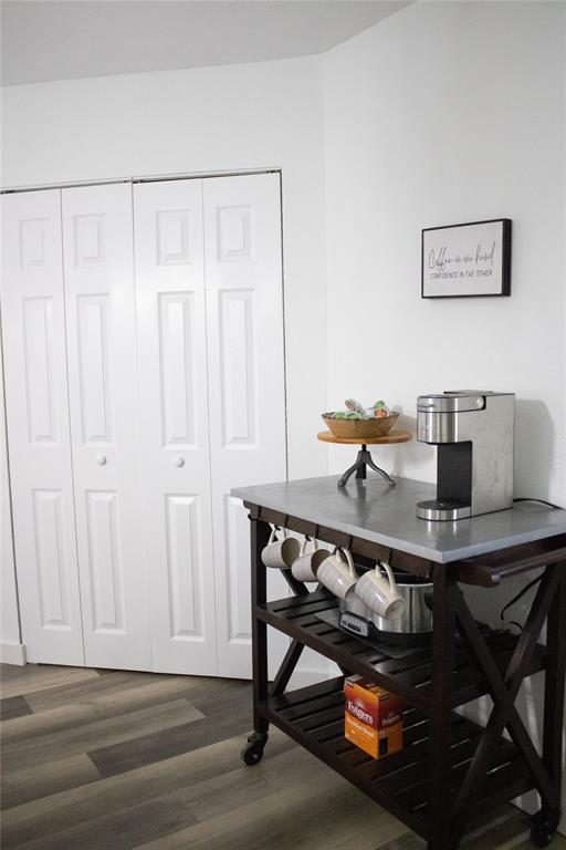 214 County Road 2147 Quitman, TX 75783 - Photo 17 of 38 a workspace with furniture and wooden floor