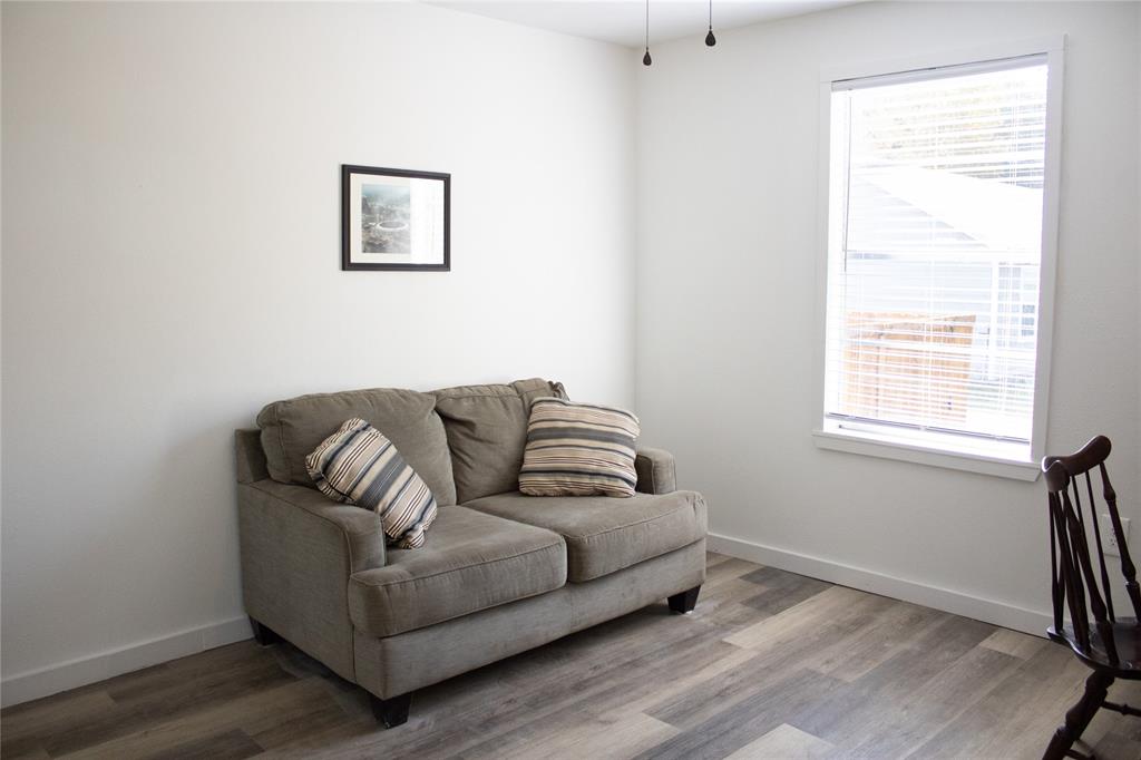 214 County Road 2147 Quitman, TX 75783 - Photo 20 of 38 a living room with furniture and a window