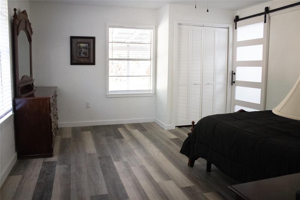 214 County Road 2147 Quitman, TX 75783 - Photo 27 of 38 a bedroom with a bed and a window