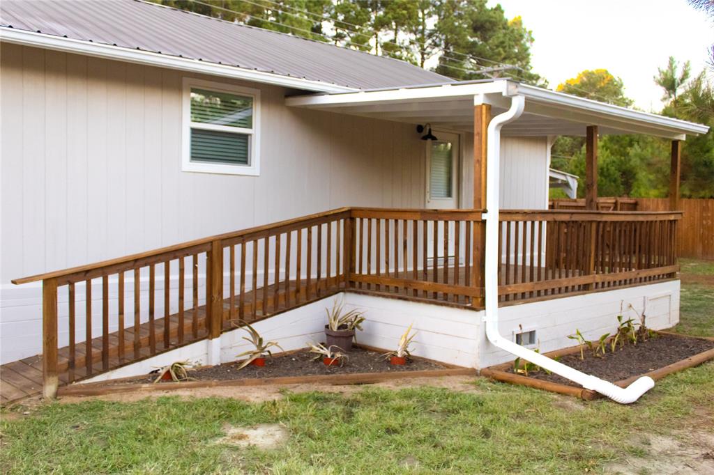 214 County Road 2147 Quitman, TX 75783 - Photo 30 of 38 a view of a chair with a small yard