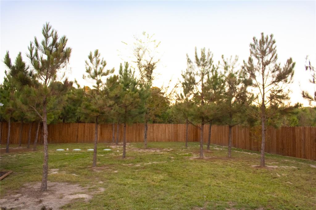 214 County Road 2147 Quitman, TX 75783 - Photo 33 of 38 a swimming pool with wooden fence
