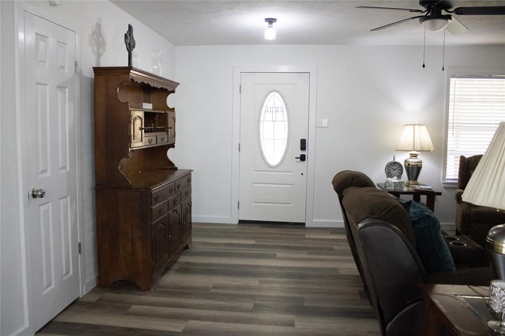 214 County Road 2147 Quitman, TX 75783 - Photo 7 of 38 a living room with furniture and a window