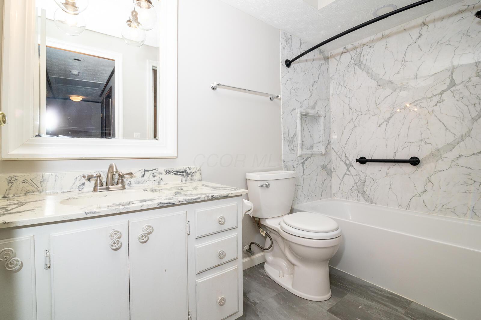 5179 Rittenhouse Square North, Unit 2379 Columbus, OH 43220 - Photo 21 of 32 Master Bathroom with Shower, Toilet and Vanity.
