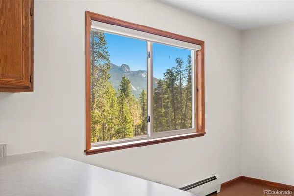 a room with a sink and cabinets
