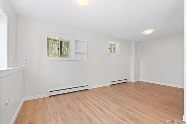 an empty room with window