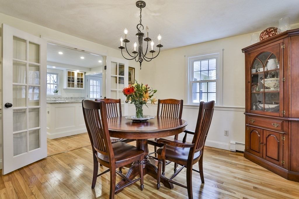 93 Teele Road Bolton, MA 01740 - Photo 21 of 40 a view of a dining room with furniture window and wooden floor