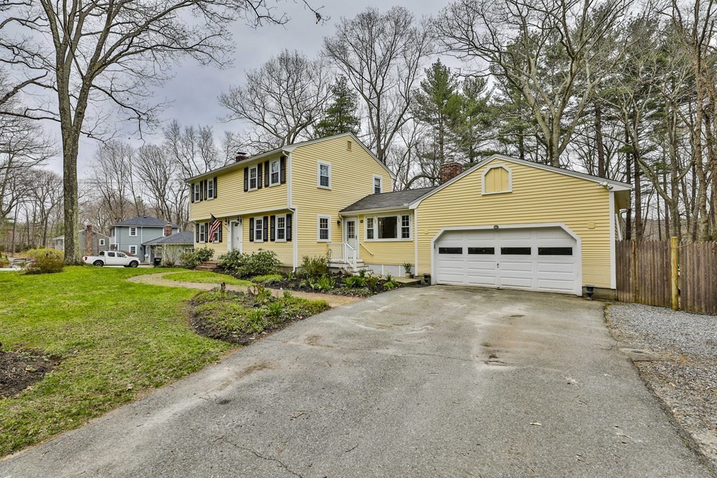 93 Teele Road Bolton, MA 01740 - Photo 3 of 40 a front view of a house with a yard