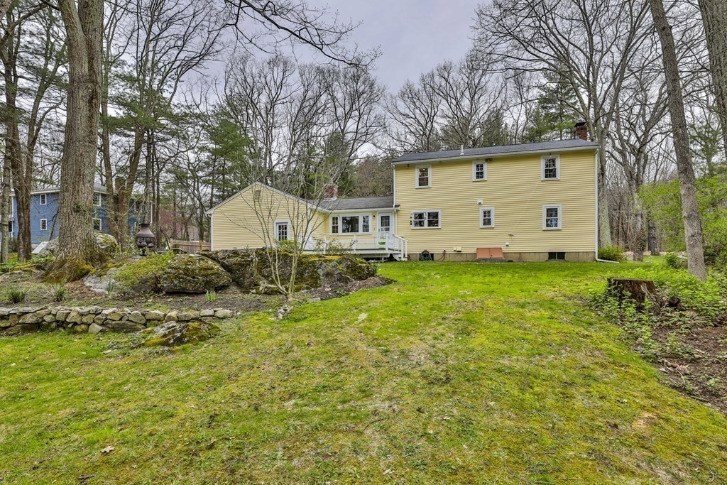 93 Teele Road Bolton, MA 01740 - Photo 5 of 40 a view of a house with backyard