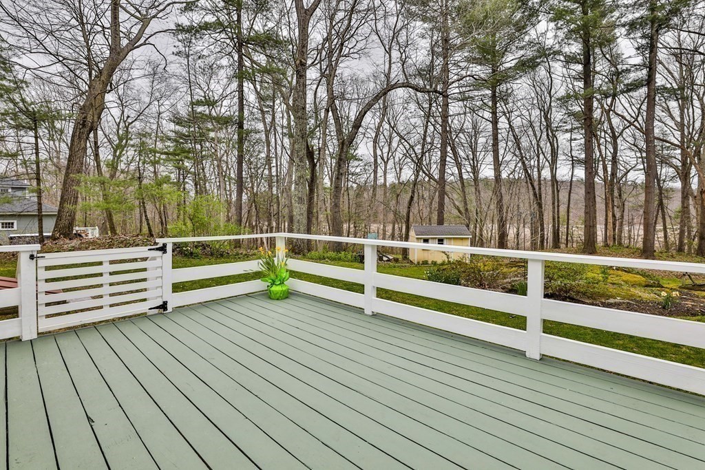 93 Teele Road Bolton, MA 01740 - Photo 8 of 40 a view of park with wooden floor and fence