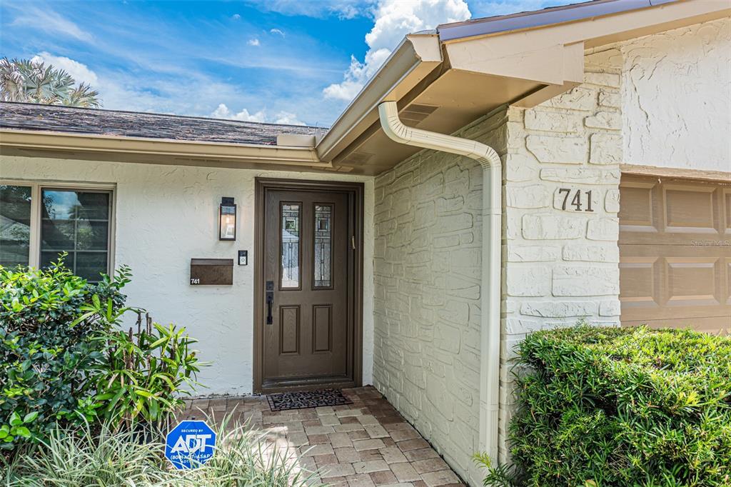 741 Brookside Road Maitland, FL 32751 - Photo 3 of 43 a view of a front door of the house