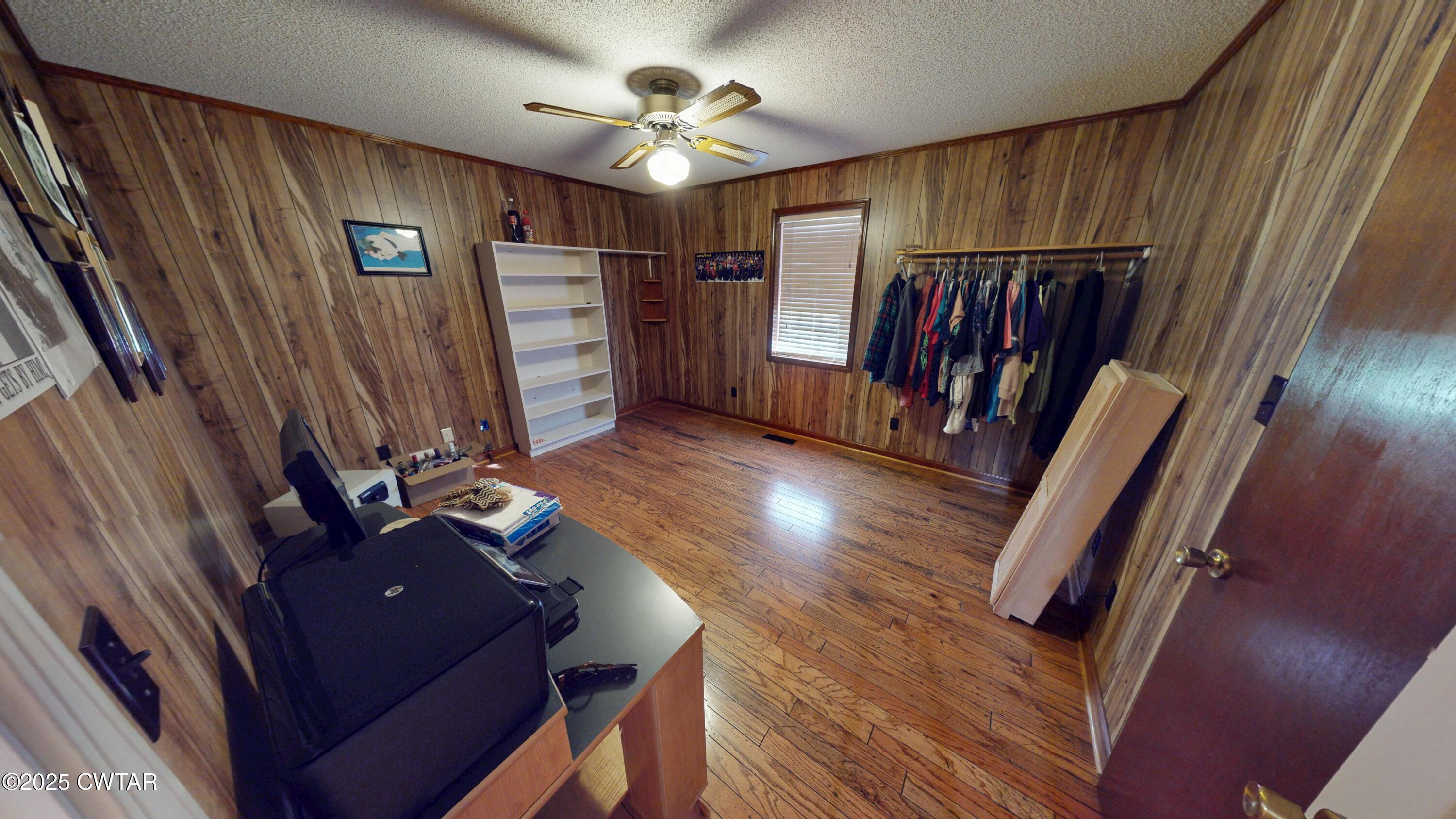 4960 Upper Finley Road Dyersburg, TN 38024 - Photo 20 of 39 a view of a livingroom with furniture and staircase