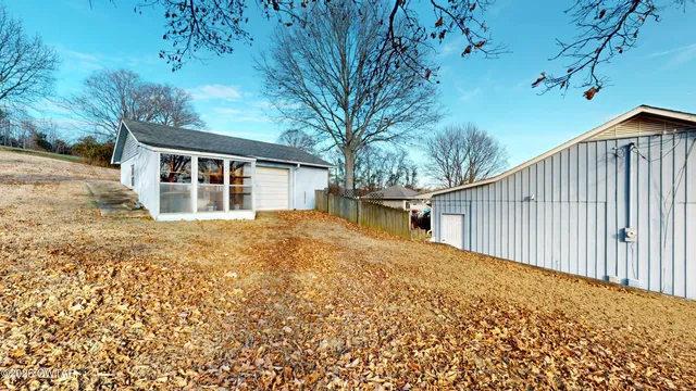 a house view with a backyard space