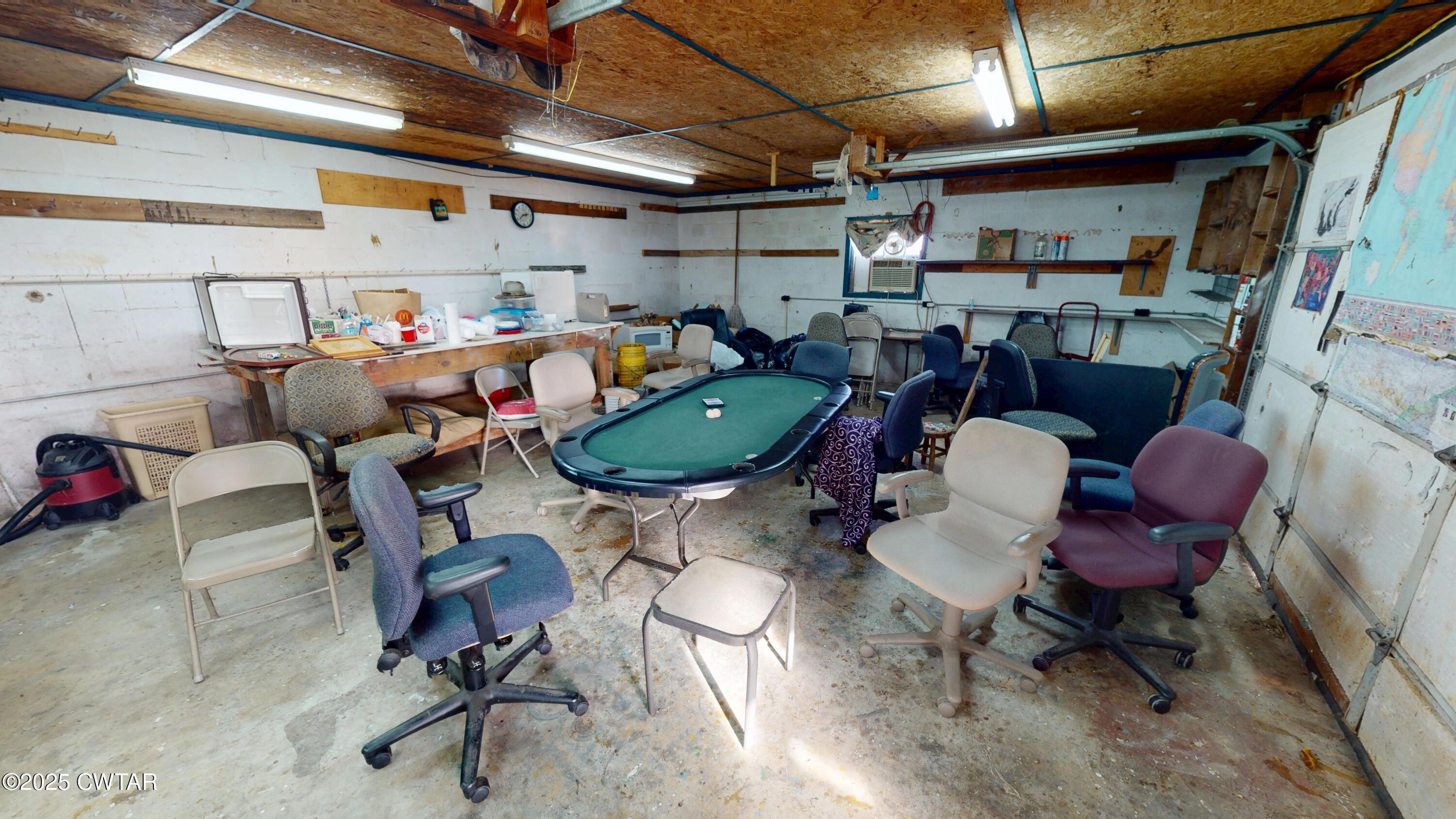 4960 Upper Finley Road Dyersburg, TN 38024 - Photo 31 of 39 a room with lots of furniture and a equipment