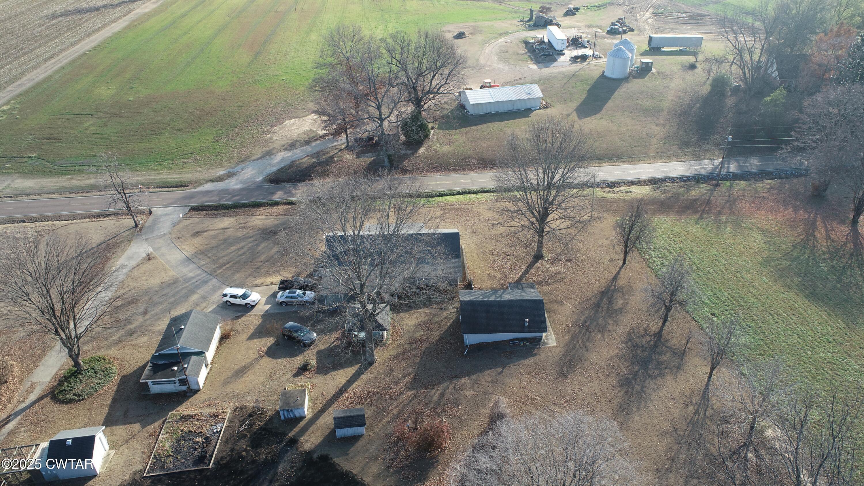 4960 Upper Finley Road Dyersburg, TN 38024 - Photo 37 of 39 an aerial view of houses with outdoor space