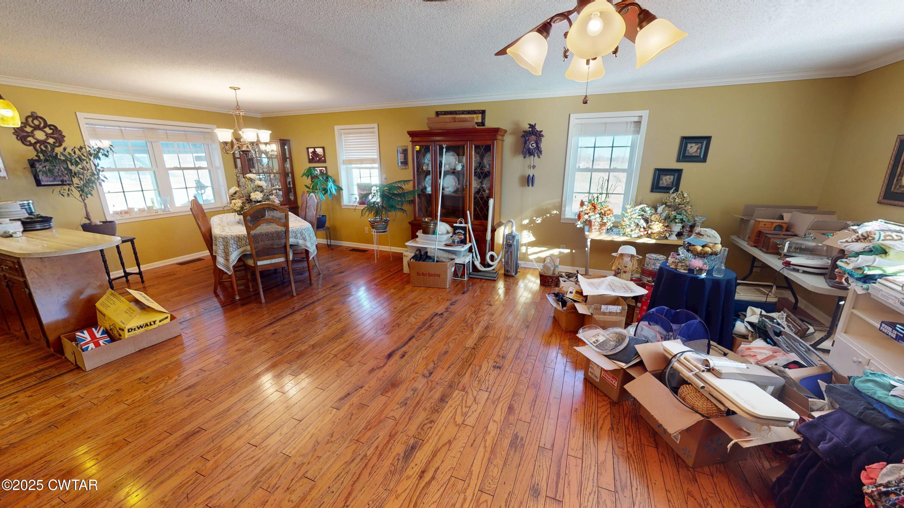 4960 Upper Finley Road Dyersburg, TN 38024 - Photo 5 of 39 a living room with furniture and wooden floor
