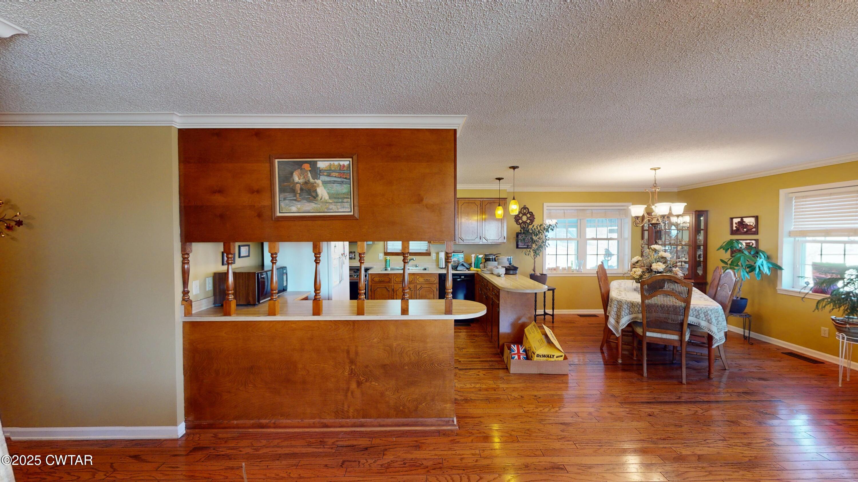 4960 Upper Finley Road Dyersburg, TN 38024 - Photo 7 of 39 a living room with furniture and wooden floor