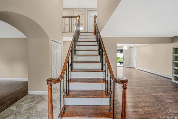 a view of a backyard with sitting area