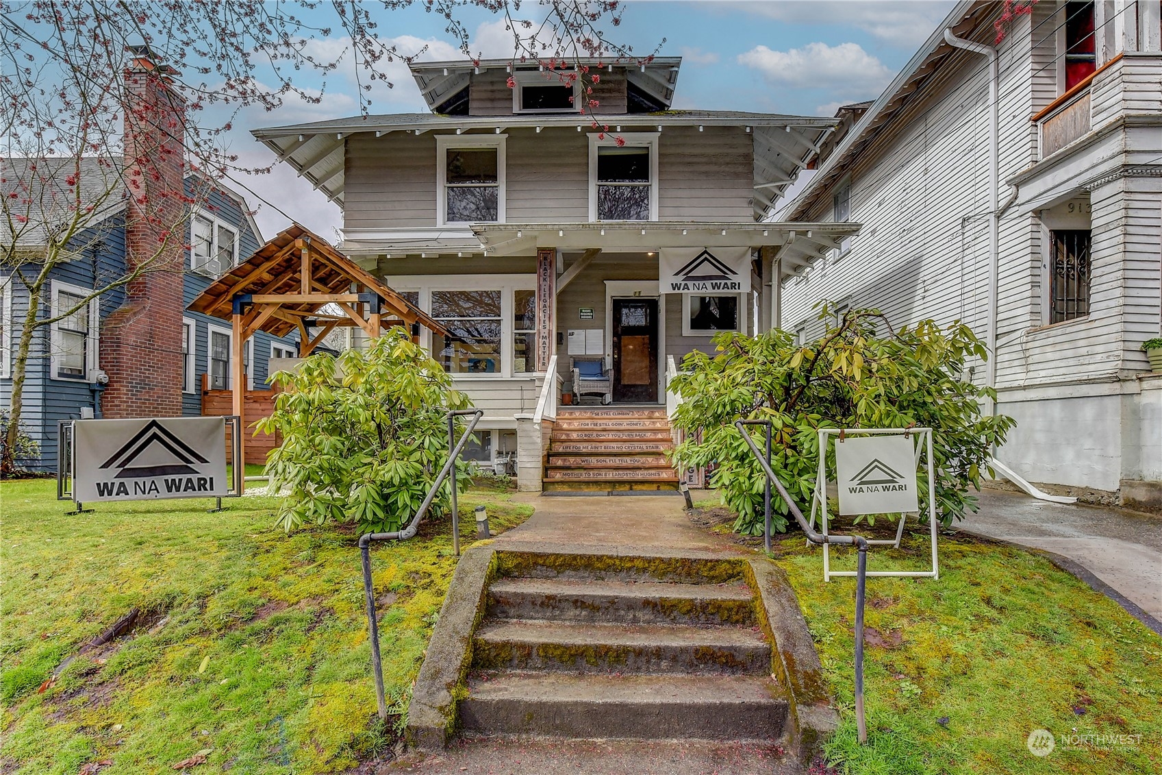 911 24th Avenue Seattle, WA 98122 - Photo 1 of 20 a view of a house with a yard