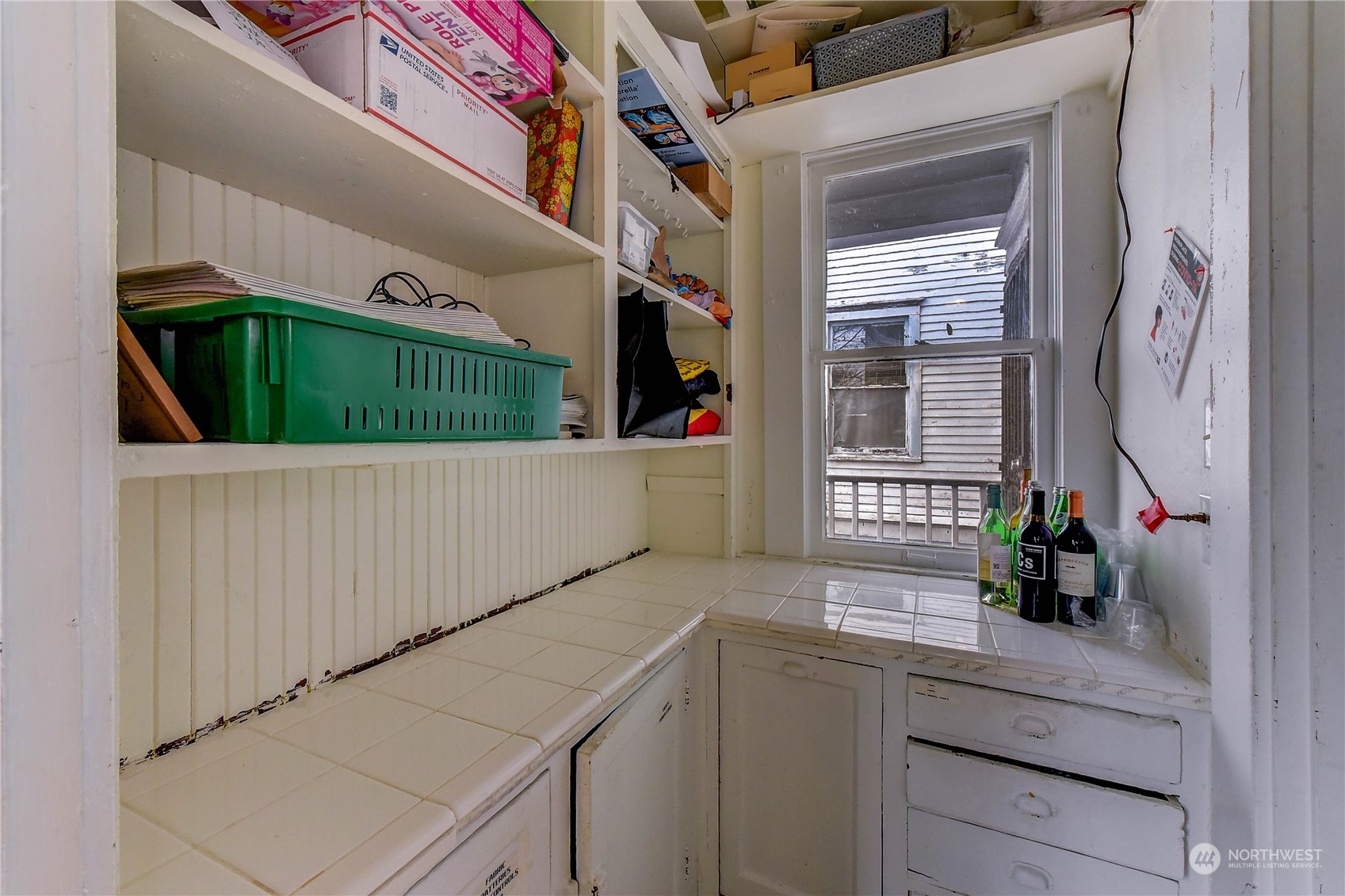 911 24th Avenue Seattle, WA 98122 - Photo 9 of 20 a bathroom with a sink and mirror