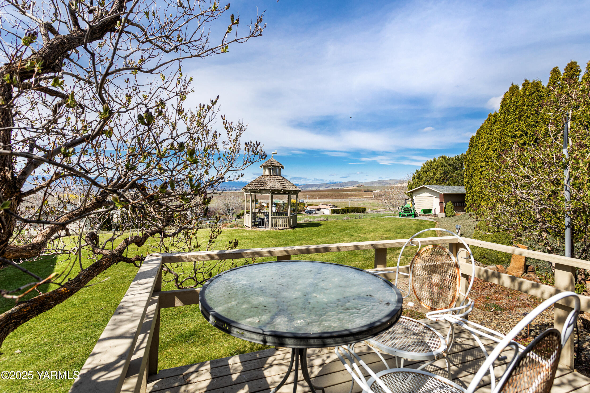 1680 St Hilaire Road Yakima, WA 98901 - Photo 13 of 22 a view of swimming pool with a table and chairs