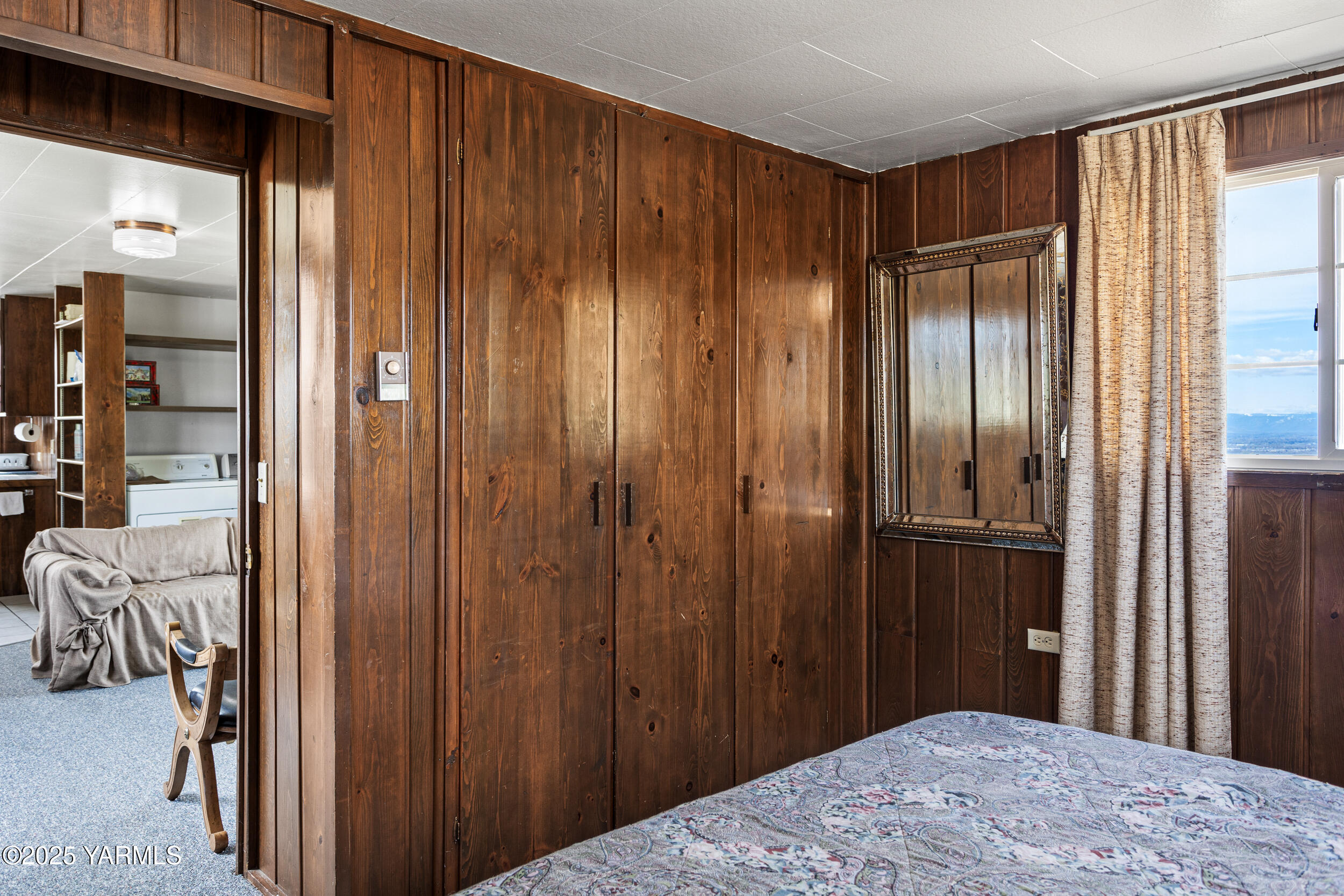 1680 St Hilaire Road Yakima, WA 98901 - Photo 10 of 22 a bedroom with a bed and a bathroom