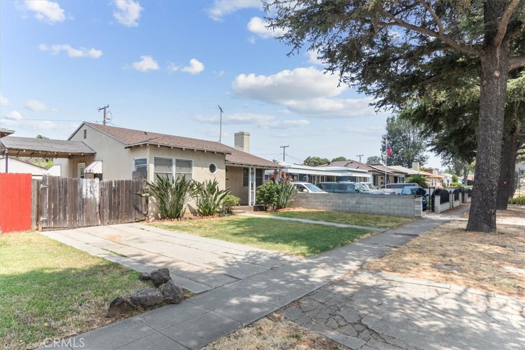 5929 Norwalk Boulevard Whittier, CA 90606 - Photo 4 of 33 a view of a house with a yard