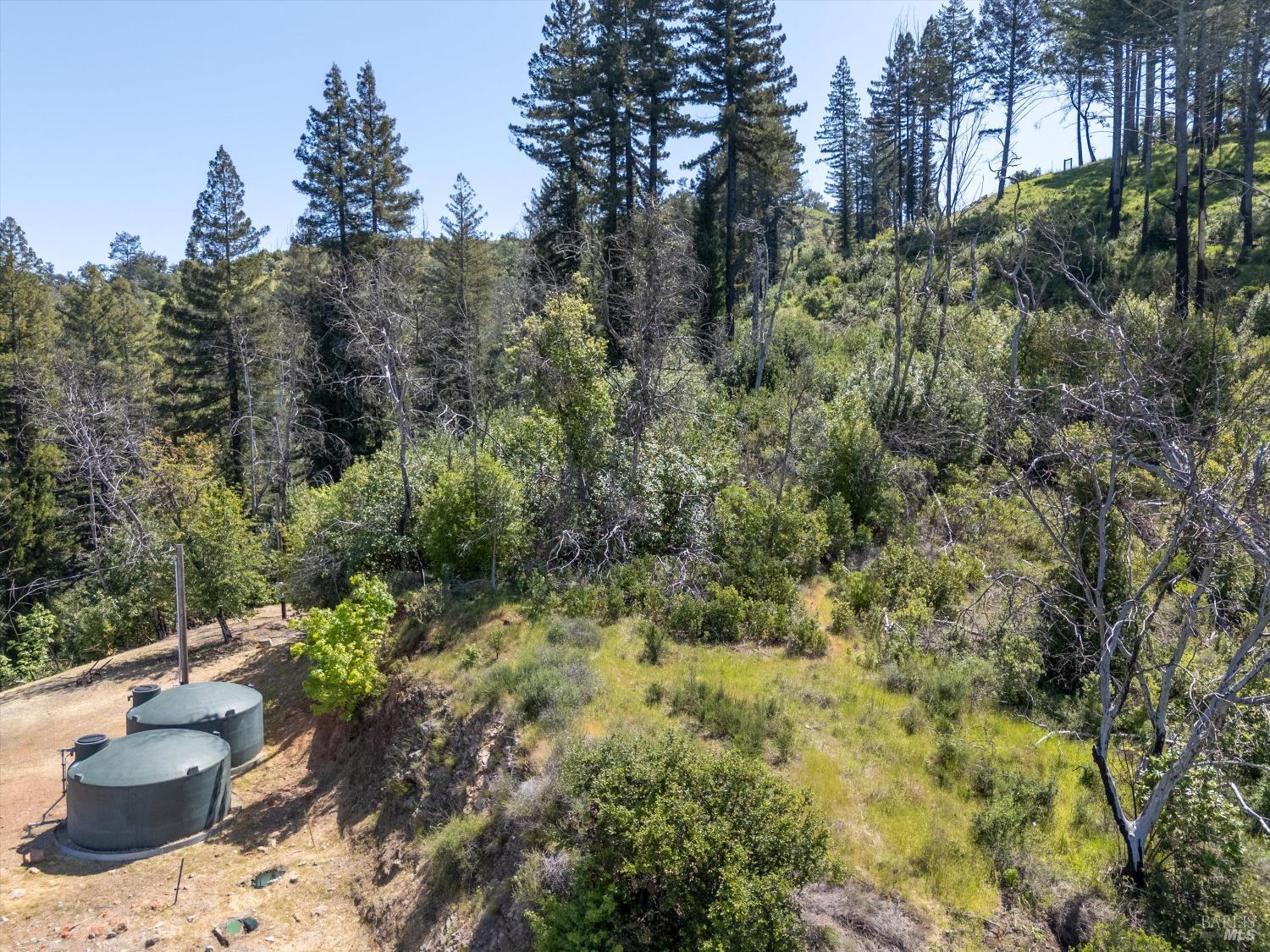 2272 Mark West Springs Road Santa Rosa, CA 95404 - Photo 20 of 29 a view of a patio and fire pit