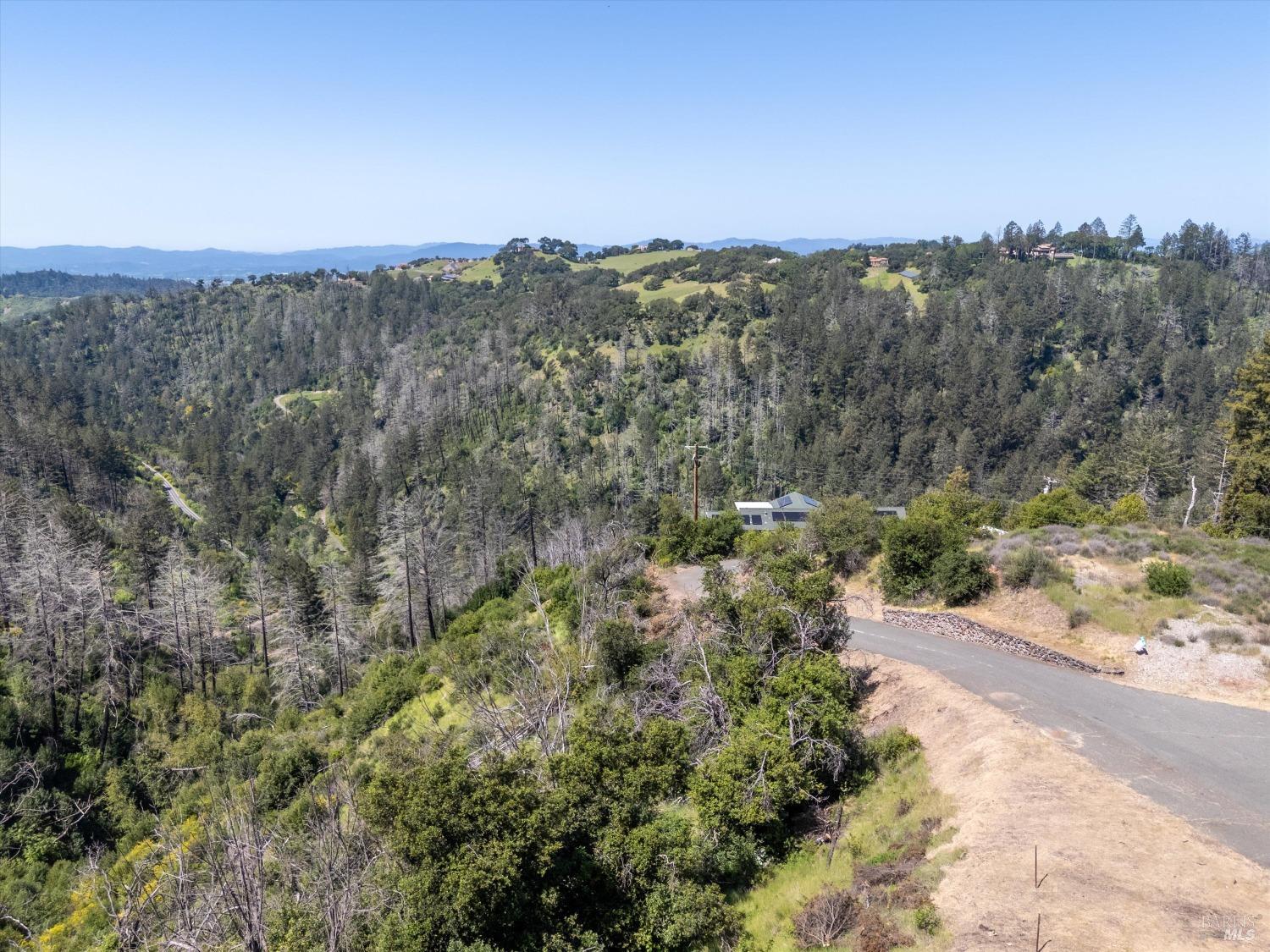 2272 Mark West Springs Road Santa Rosa, CA 95404 - Photo 21 of 29 a view of a road with mountains in the background