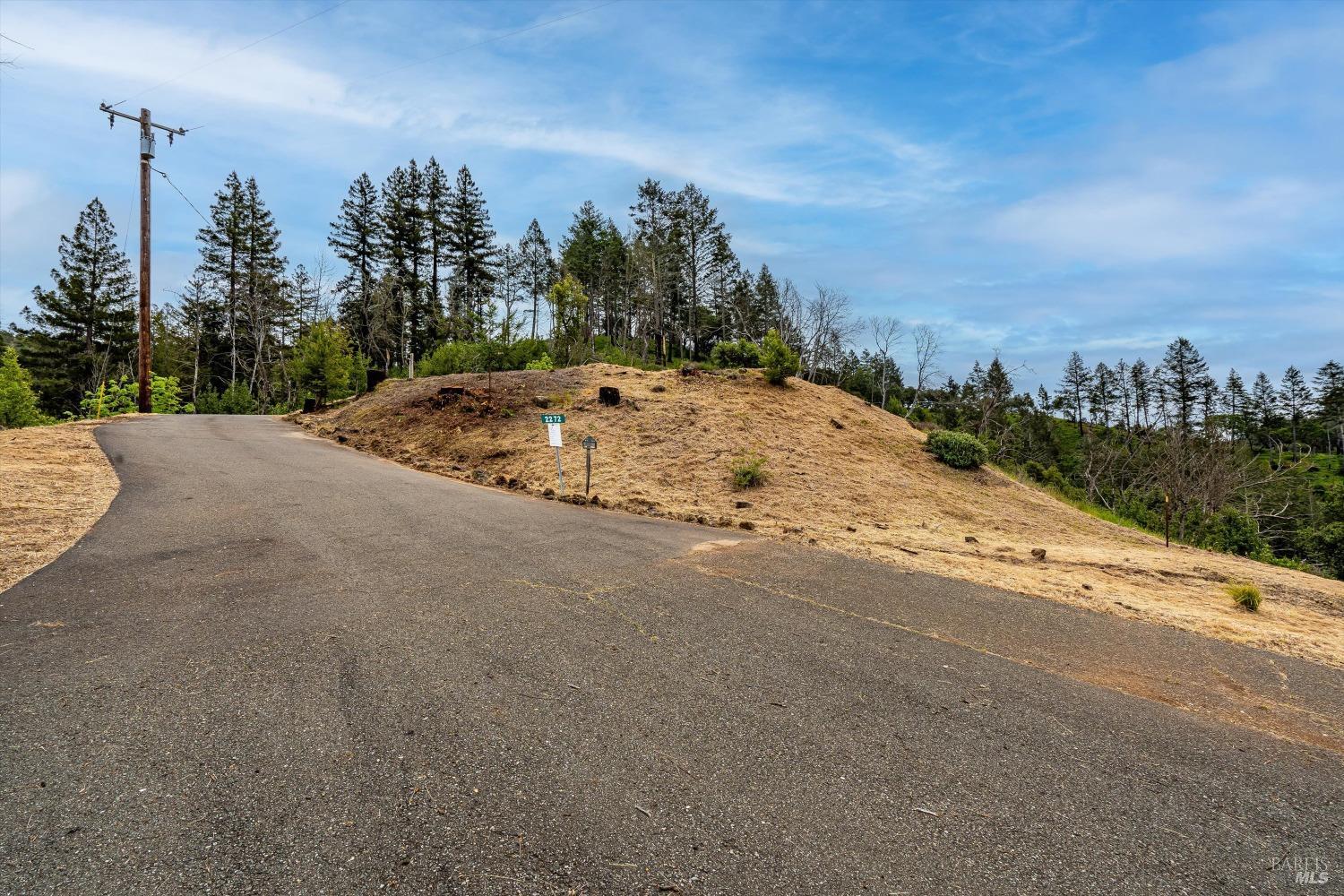 2272 Mark West Springs Road Santa Rosa, CA 95404 - Photo 23 of 29 a view of a road with a yard