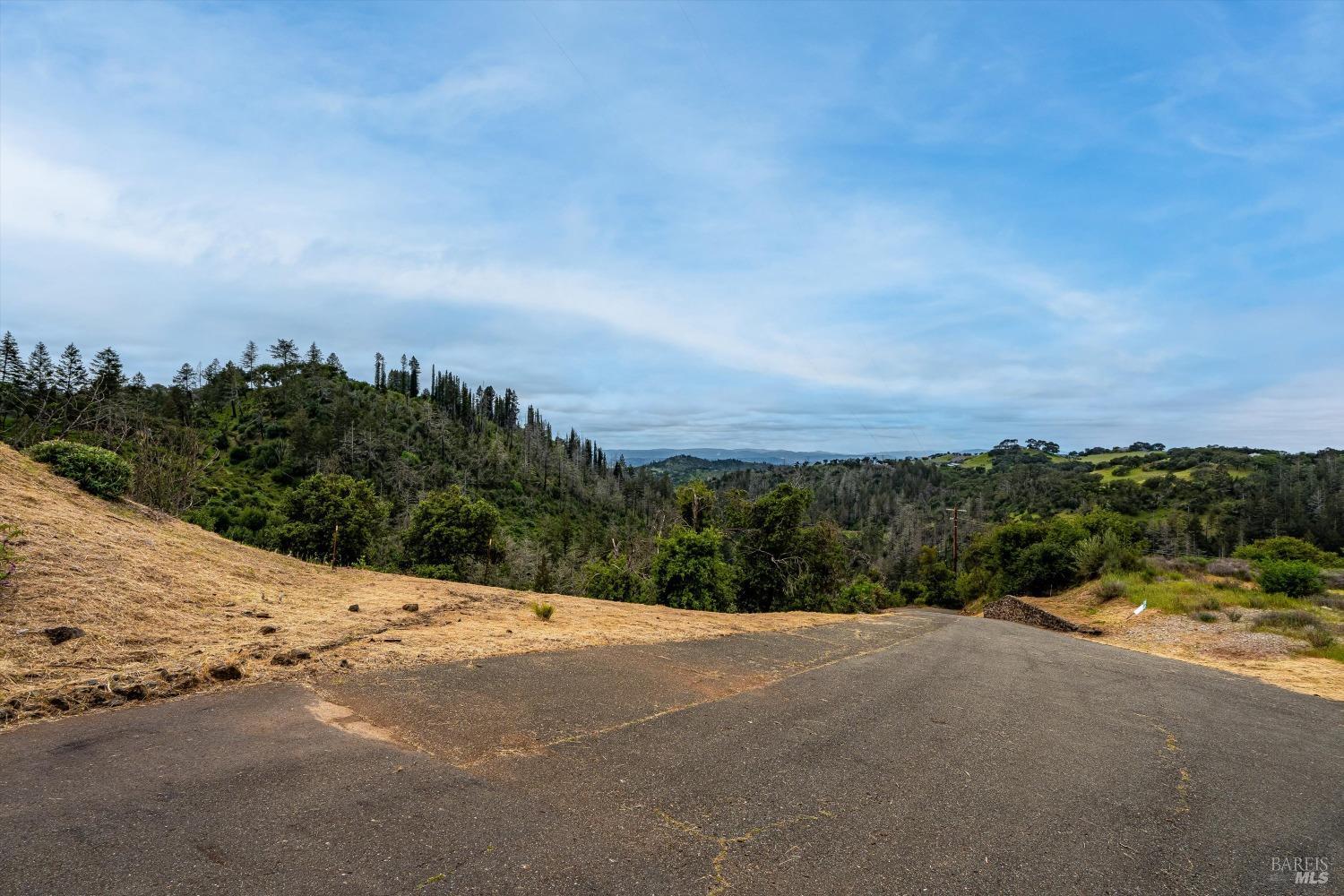 2272 Mark West Springs Road Santa Rosa, CA 95404 - Photo 24 of 29 a view of a road with a building in the background