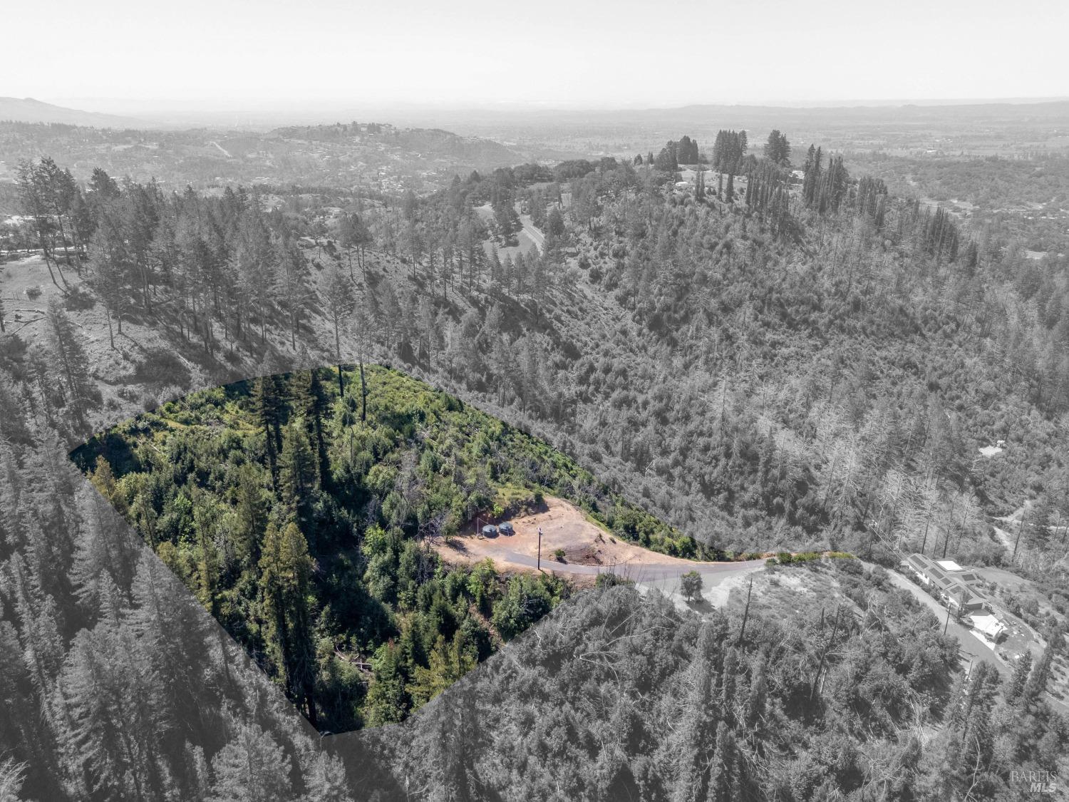 2272 Mark West Springs Road Santa Rosa, CA 95404 - Photo 3 of 29 a view of a city with lush green forest