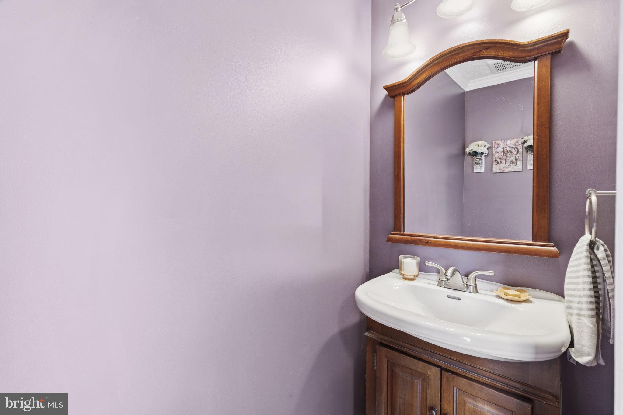 853 Comer Square Bel Air, MD 21014 - Photo 11 of 35 a bathroom with a sink and a mirror