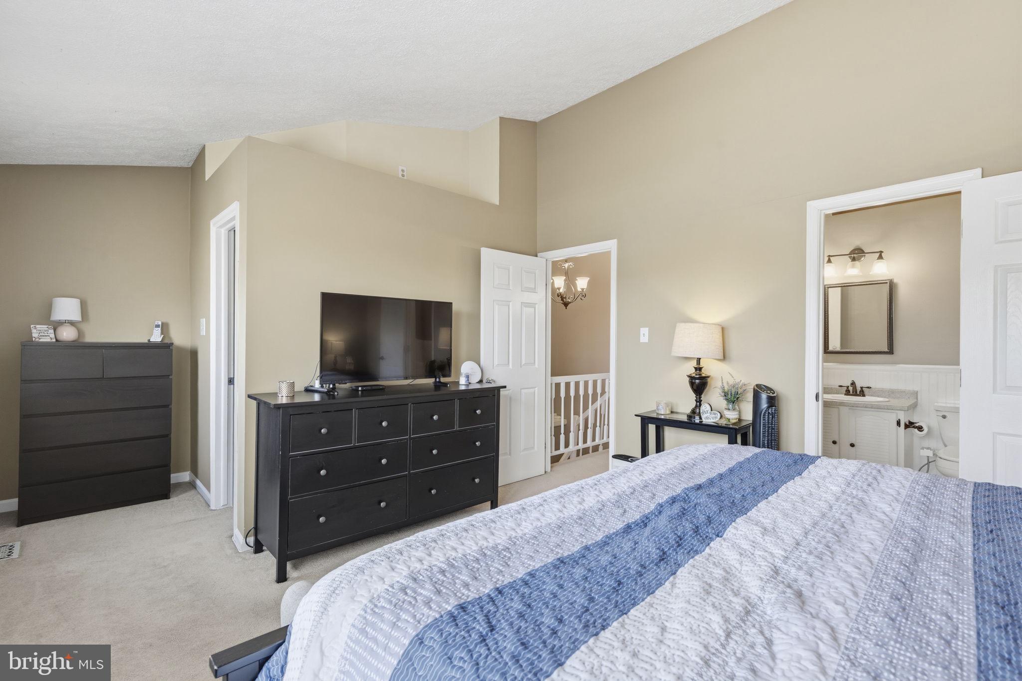 853 Comer Square Bel Air, MD 21014 - Photo 14 of 35 a bedroom with a bed and a mirror