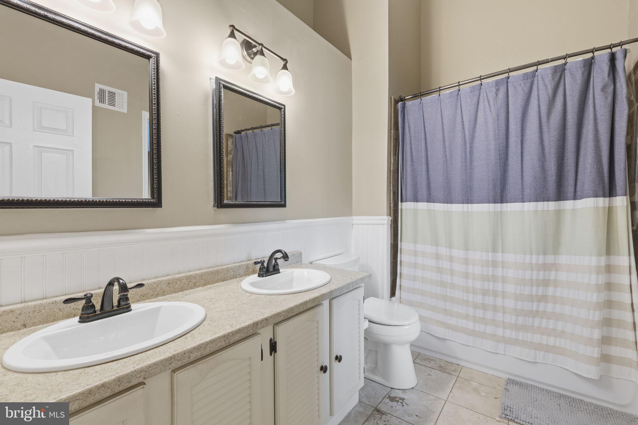 853 Comer Square Bel Air, MD 21014 - Photo 15 of 35 a bathroom with a sink and a mirror