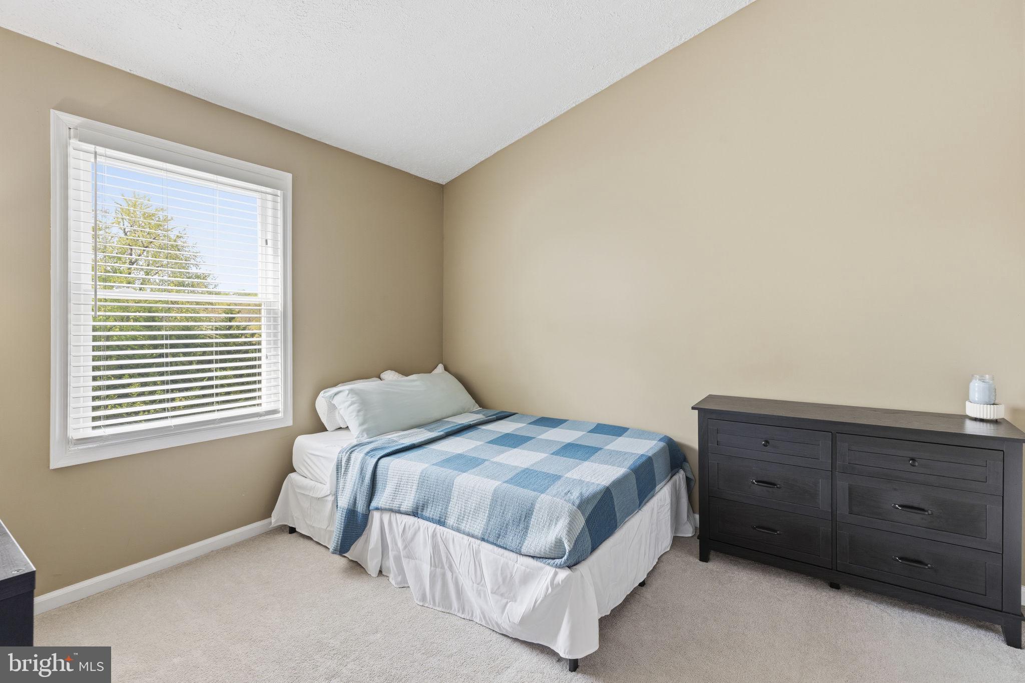 853 Comer Square Bel Air, MD 21014 - Photo 16 of 35 a bedroom with a bed and a window