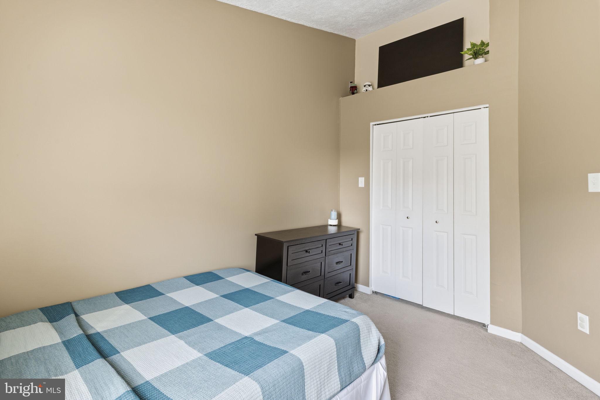 853 Comer Square Bel Air, MD 21014 - Photo 17 of 35 a bedroom with a bed and a dresser