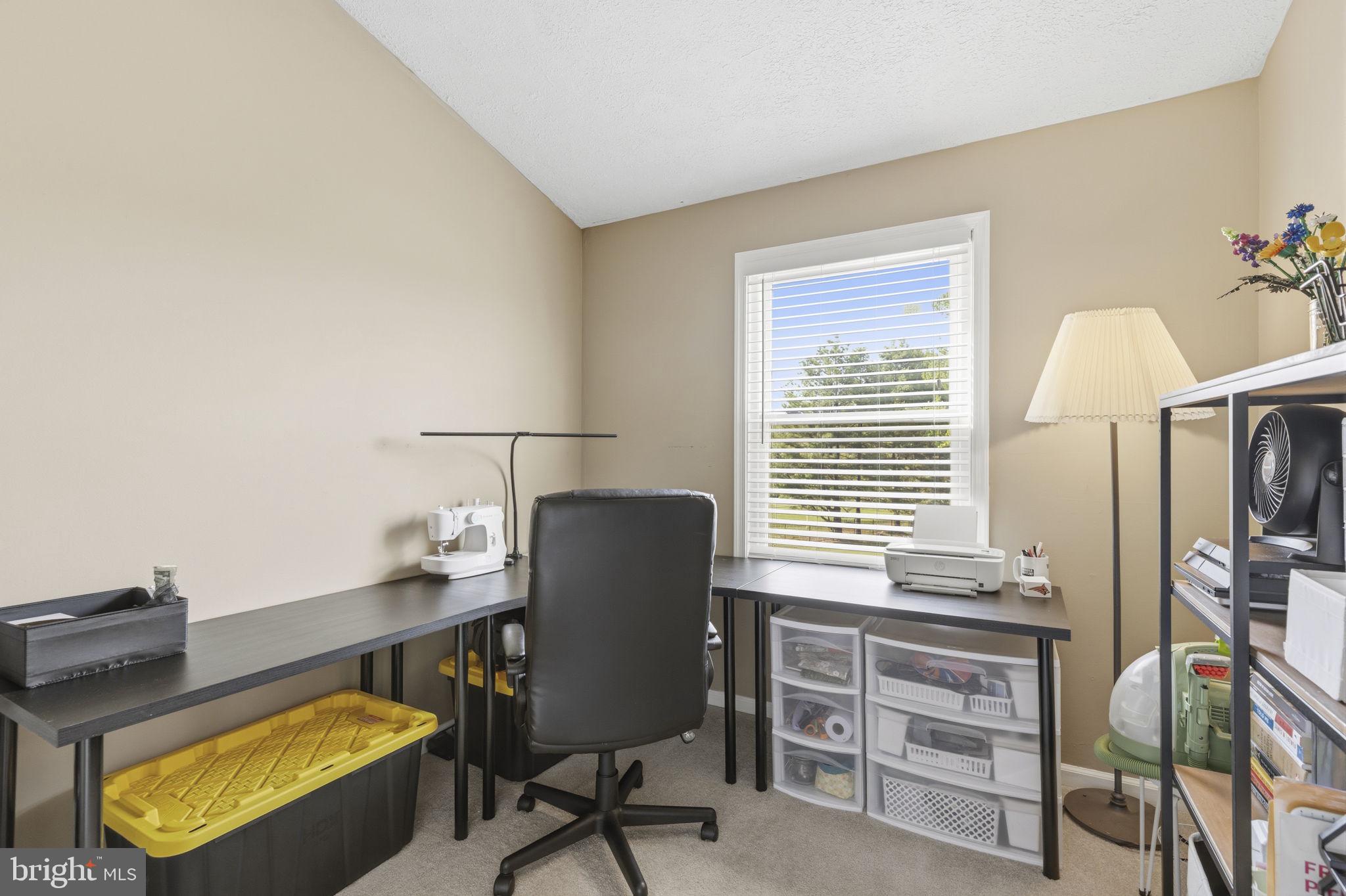 853 Comer Square Bel Air, MD 21014 - Photo 18 of 35 a view of a workspace with furniture and a window