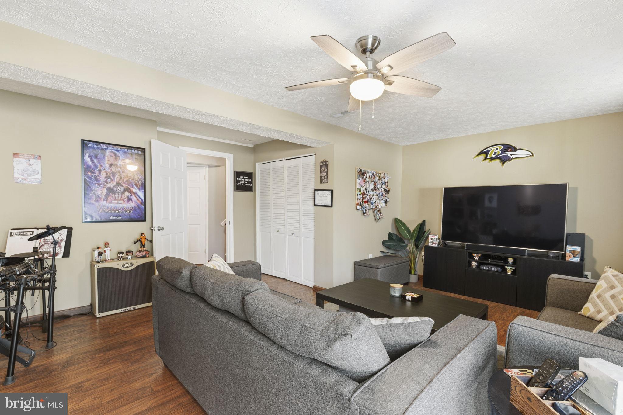 853 Comer Square Bel Air, MD 21014 - Photo 20 of 35 a living room with furniture and a flat screen tv