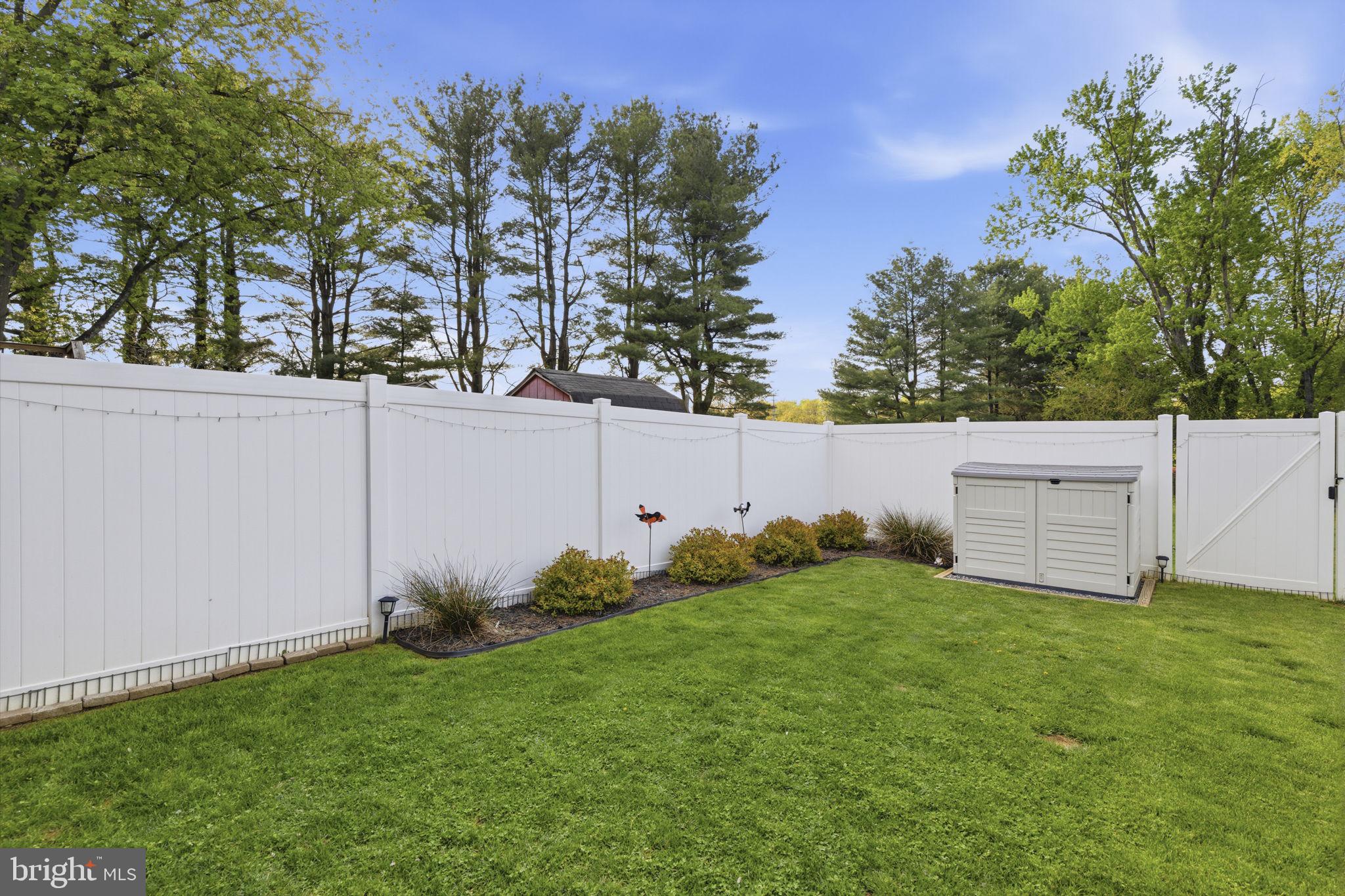 853 Comer Square Bel Air, MD 21014 - Photo 26 of 35 a backyard of a house with lots of green space