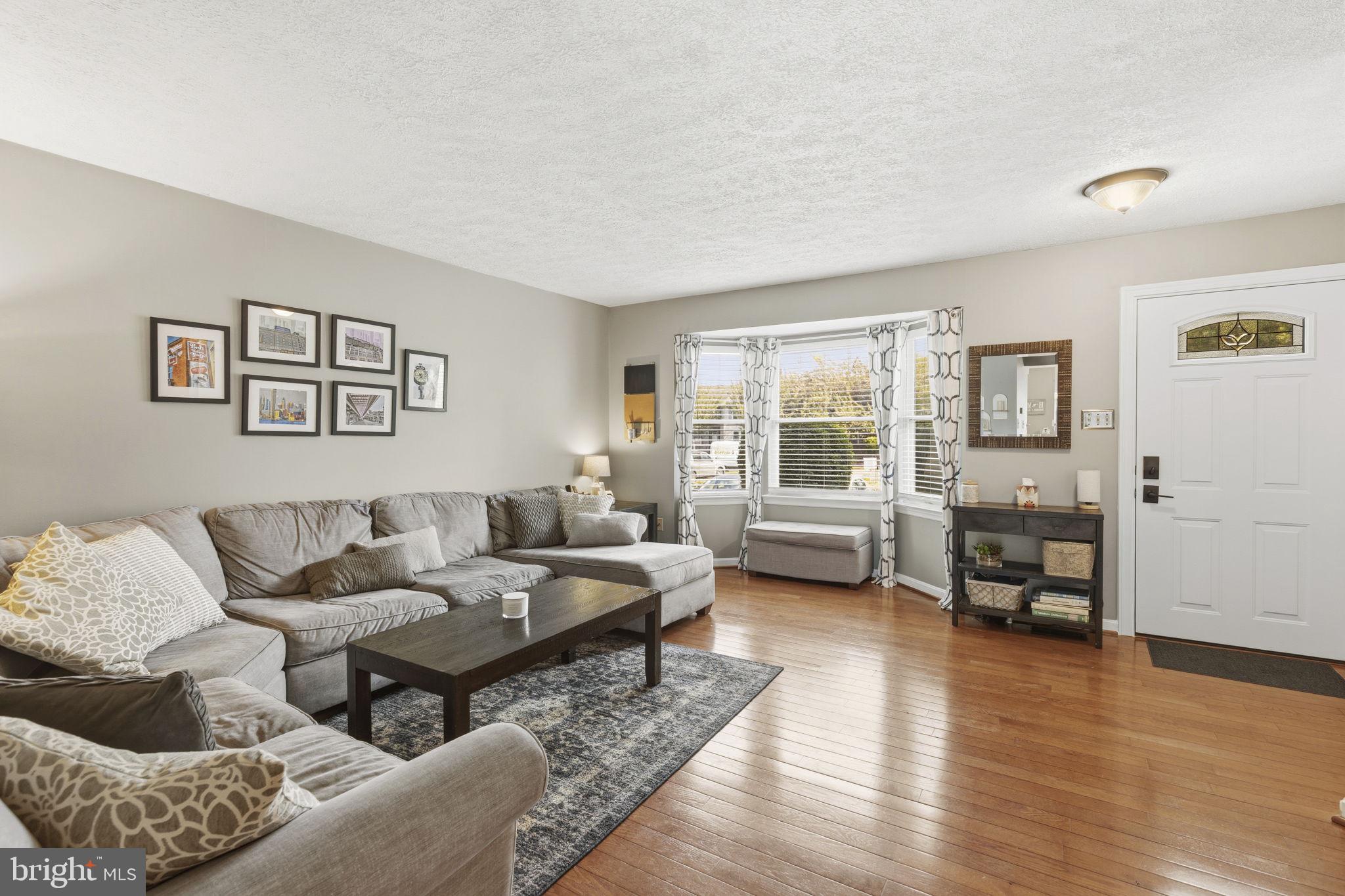 853 Comer Square Bel Air, MD 21014 - Photo 3 of 35 a living room with furniture and a large window