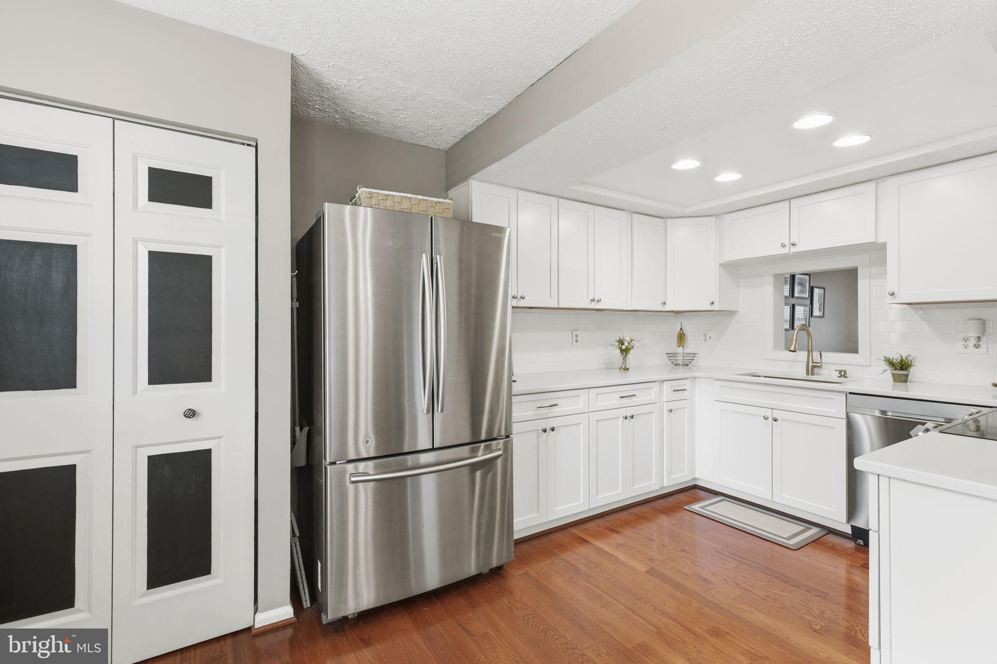 853 Comer Square Bel Air, MD 21014 - Photo 6 of 35 a kitchen with granite countertop appliances a sink and a refrigerator