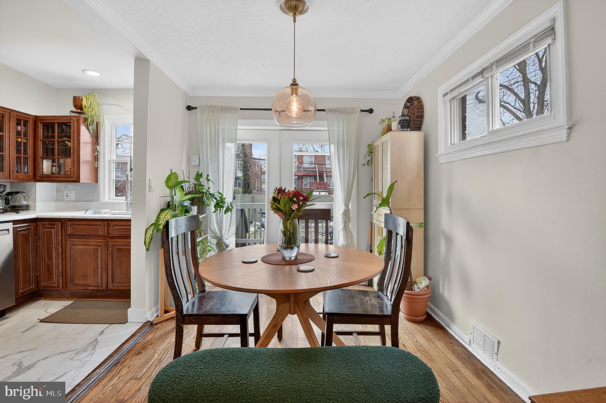 162 Forrester Street Southwest Washington, DC 20032 - Photo 12 of 28 a view of a dining room with furniture and window