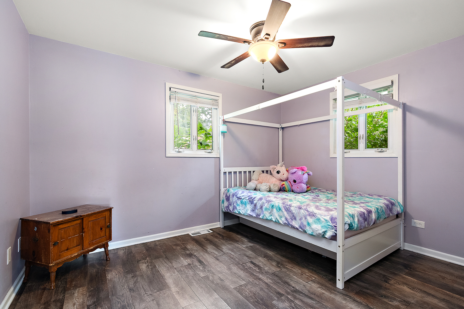 3129 Butler Avenue Steger, IL 60475 - Photo 11 of 20 a bedroom with bed and a chandelier