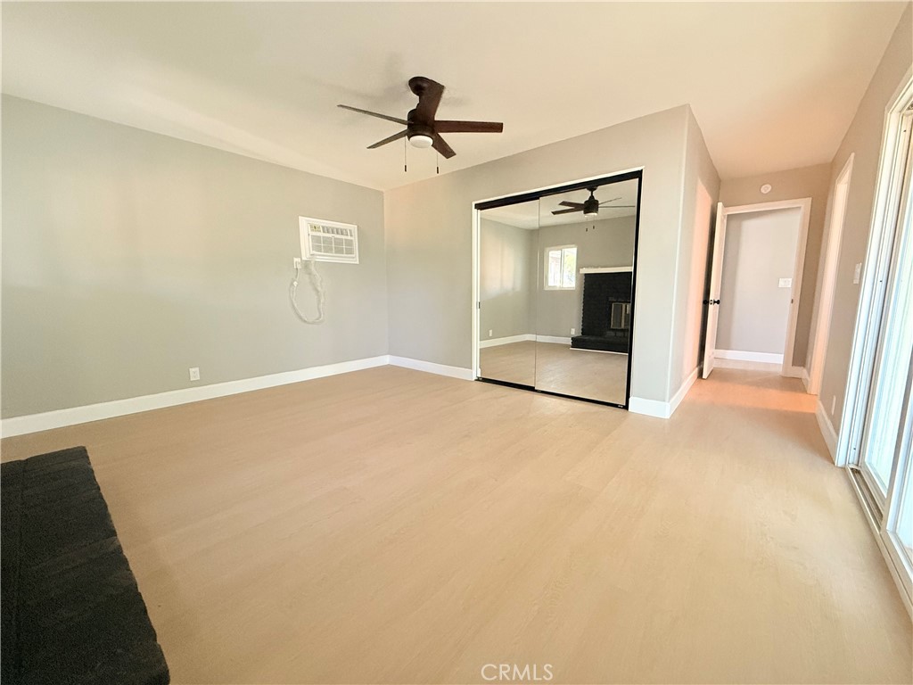 8803 Laurel Street Bellflower, CA 90706 - Photo 14 of 18 an empty room with a empty space and windows