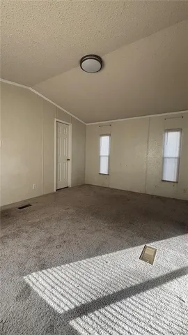 a view of a hallway view with staircase