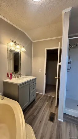 a bathroom with a double vanity sink and mirror